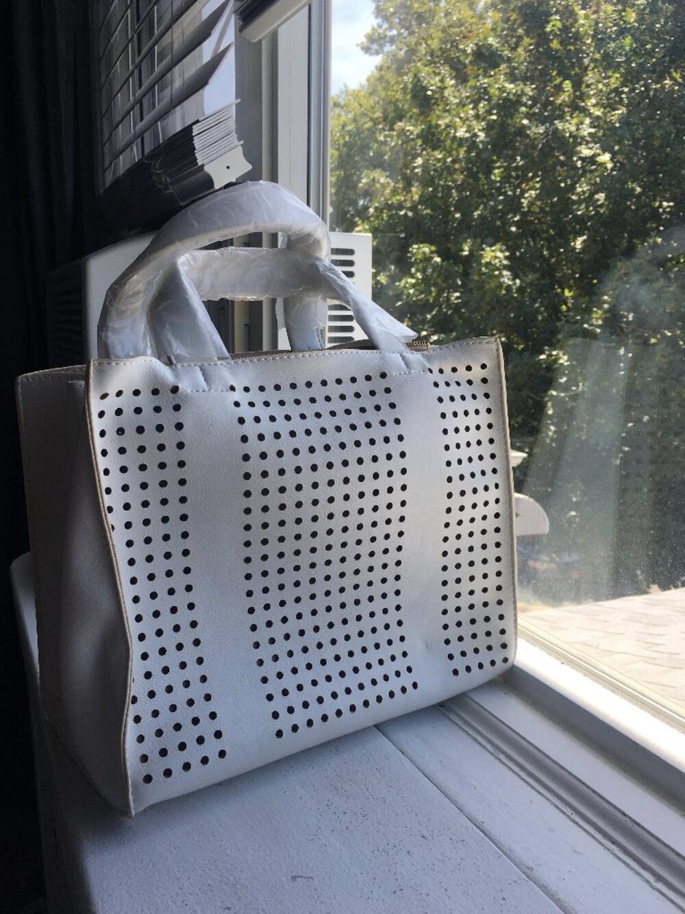 Brand new White hollow work chic design totes hand bag